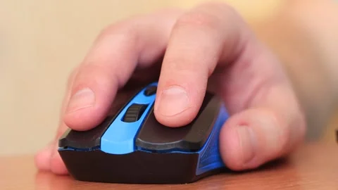Man's hand clicks on a computer mouse Stock Footage 260005801