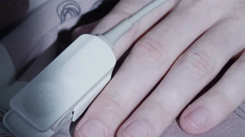 A man's hand close up  in intensive care unit at the hospital Stock Footage 62554536