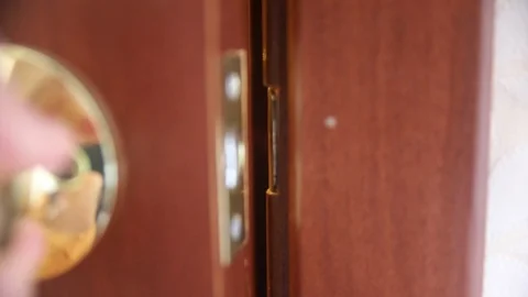 Man's hand closes the door Stock Footage 116664050