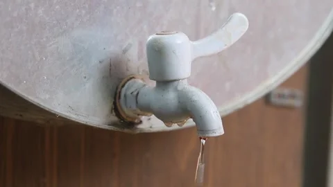 Man's hand closes  tap Stock Footage 257623762