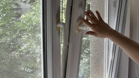 Man's Hand Closing His Bedrrom Window, Side Shot Stock Footage 66460322