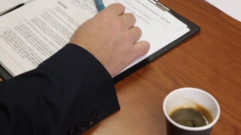 Man's hand with coffee Stock Footage 104229075