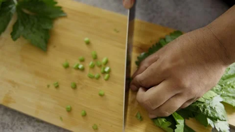 Man's hand cutting celery Stock-Footage 272182039
