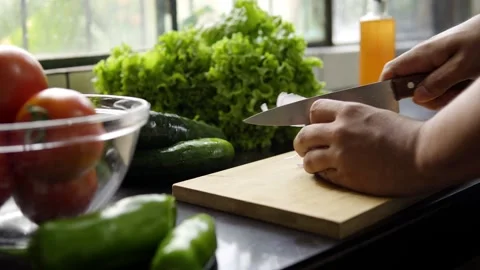 Man's hand cutting onions Stock Footage 272182152