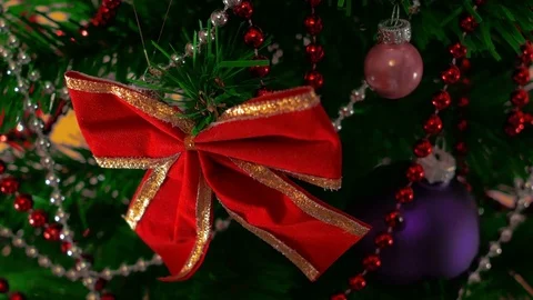 Mans hand decorating christmas tree. Close Up Stock Footage 83859352