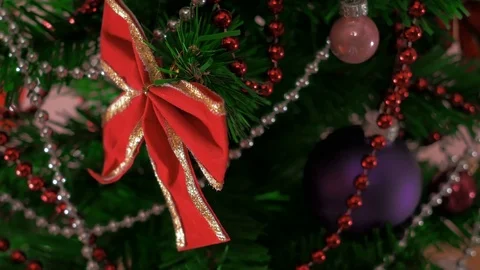 Mans hand decorating christmas tree. Close Up Stock Footage 83861823