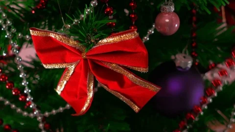 Mans hand decorating christmas tree. Close Up Stock Footage 83863788