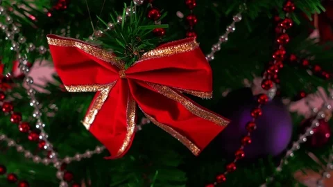 Mans hand decorating christmas tree. Close Up Stock Footage 83864318