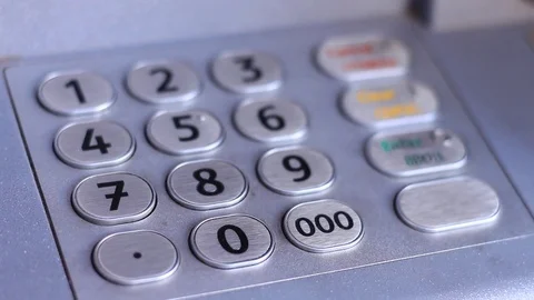 Man's hand dials the code on the ATM keyboard. Close-Up Stock Footage 82985328