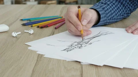 Man's hand draws a pencil in studio. Stock Footage 85667896