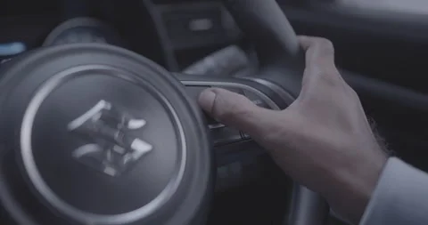 A man's hand is driving a car Stock Footage 270716066