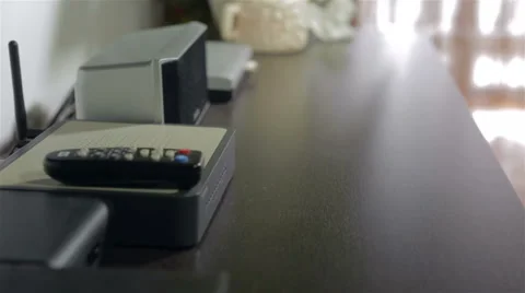 Man's hand dusting the TV stand Stock Footage 41471841