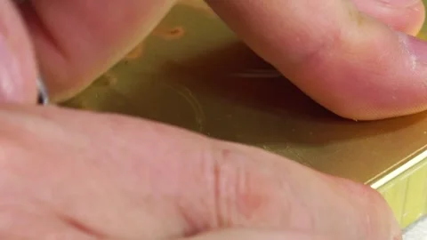 A man's hand, a finger pulls the ring and opens an aluminum can of canned smo Video stock 158326950