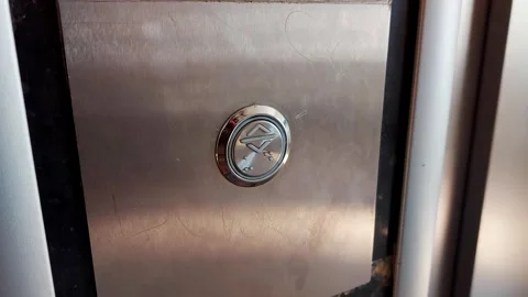Mans hand fingers pressing the elevator button, close-up Stock Footage 303621457
