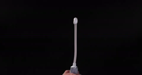 A man's hand forcibly squeezes the toothpaste out of the tube Stock Footage 161941321