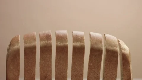 Man's hand gather the slices of bread to bread brick Stock Footage 84596133