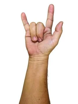 Man's hand gesturing rock and roll, heavy metal, devil horns gesture or I l.. Stock Photos