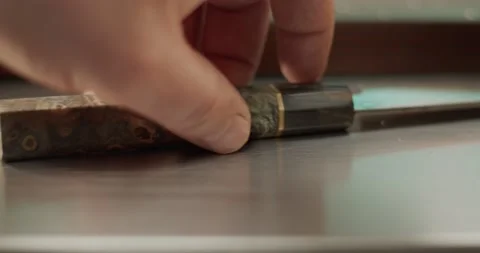 Man's Hand Grabs Knife Front Close Up Shot 4K 23.98 fps Stock Footage 149628342