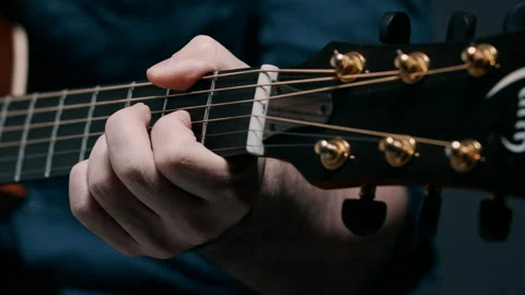 Man's hand on guitar neck Video stock 130790180