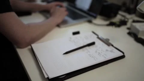 Mans Hand Holding a Pen While Writing on a Notebook. Journaling his thought.. Stock-Footage 306064702