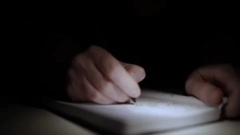 Mans Hand Holding a Pen While Writing on a Notebook. Journaling his thought.. Vidéo 306064837
