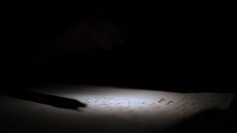 Mans Hand Holding a Pen While Writing on a Notebook. Journaling his thought.. Stock Footage 306065048