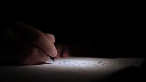 Mans Hand Holding a Pen While Writing on a Notebook. Journaling his thought.. Видео 306066587