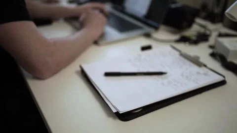 Mans Hand Holding a Pen While Writing on a Notebook. Journaling his thought.. Stock-Footage 306067806