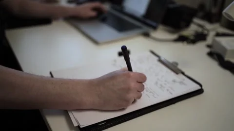 Mans Hand Holding a Pen While Writing on a Notebook. Journaling his thought.. 스톡 동영상 306068003