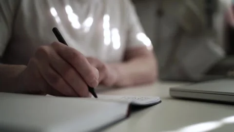 Mans Hand Holding a Pen While Writing on a Notebook. Journaling his thought.. Vídeos de archivo 306069145