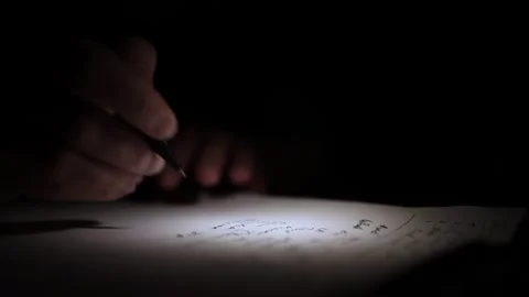 Mans Hand Holding a Pen While Writing on a Notebook. Journaling his thought.. Stock Footage 306069172
