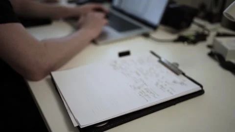 Mans Hand Holding a Pen While Writing on a Notebook. Journaling his thought.. Video stock 306069246