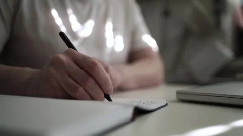 Mans Hand Holding a Pen While Writing on a Notebook. Journaling his thought.. 스톡 동영상 306069288