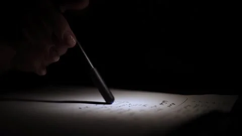 Mans Hand Holding a Pen While Writing on a Notebook. Journaling his thought.. Stock Footage 306069331
