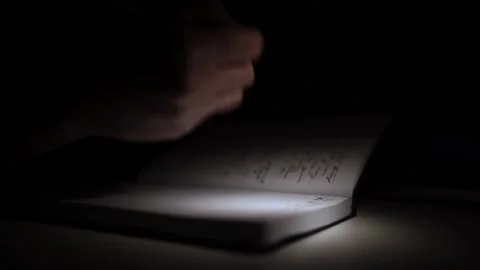 Mans Hand Holding a Pen While Writing on a Notebook. Journaling his thought.. Video stock 306069988