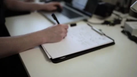 Mans Hand Holding a Pen While Writing on a Notebook. Journaling his thought.. 스톡 동영상 306070009