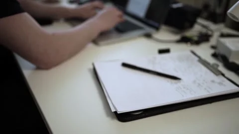 Mans Hand Holding a Pen While Writing on a Notebook. Journaling his thought.. Stock-Footage 306070017