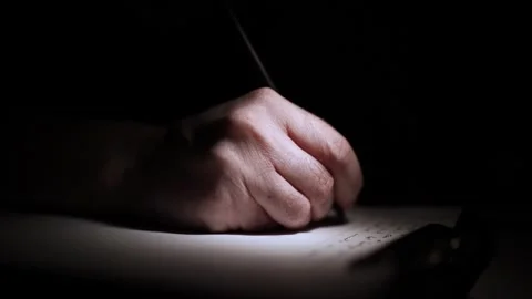 Mans Hand Holding a Pen While Writing on a Notebook. Journaling his thought.. 스톡 동영상 306070125