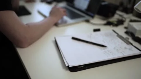Mans Hand Holding a Pen While Writing on a Notebook. Journaling his thought.. Video stock 306070152