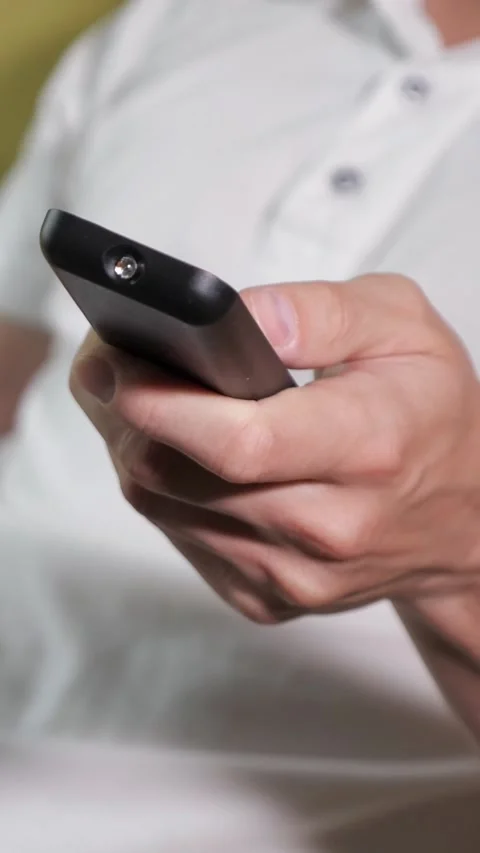 Mans hand holding a remote control for a tv Stock-Footage 341447148