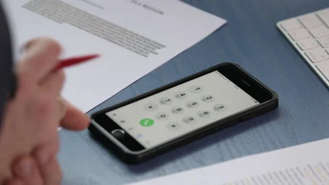 Man's hand holding screen mobile phone with numbers. Stock Footage 207844354