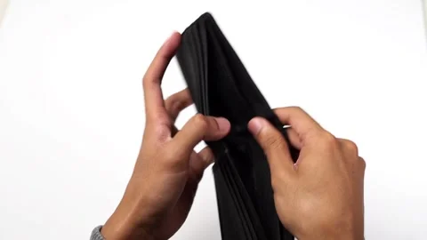 A man's hand holds an empty wallet that has no money in it. wallet for mone.. Stock Footage 272390575