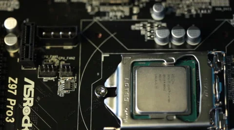 Man's hand installing Intel processor socket Stock Footage 47289139