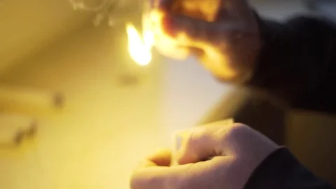 Man's hand is lighting a candle Stock-Footage 71955186