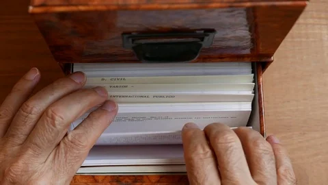 Man's hand looking at a file Video stock 80282996