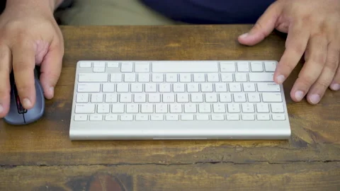 Man's Hand On a Mac keyboard Stock Footage 156258903