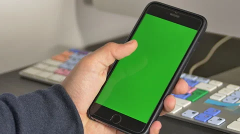 Man"s Hand Making Shuffling Gestures On A Smart Phone With Green Screen Stock Footage 64044620