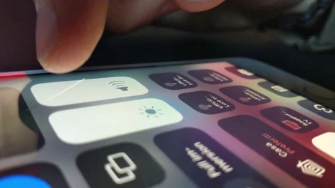 Man's hand mute the iphone. silent phone from setting. Stock Footage 236977159