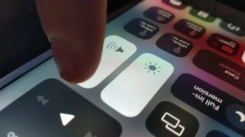Man's hand mute the iphone. silent phone from setting. Stock Footage 236977216