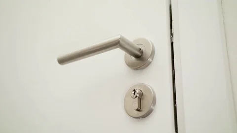 A Man's Hand Opening a Door Stock Footage 82644335